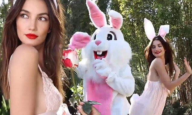 Lily Aldridge in pink lingerie dances with the Easter bunny for ...