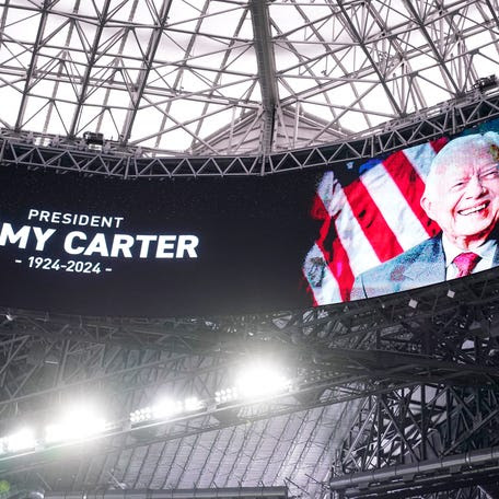 Jan 1, 2025; Atlanta, GA, USA; A general view of a memoriam for former President Jimmy Carter before the Peach Bowl at Mercedes-Benz Stadium. Mandatory Credit: Dale Zanine-Imagn Images