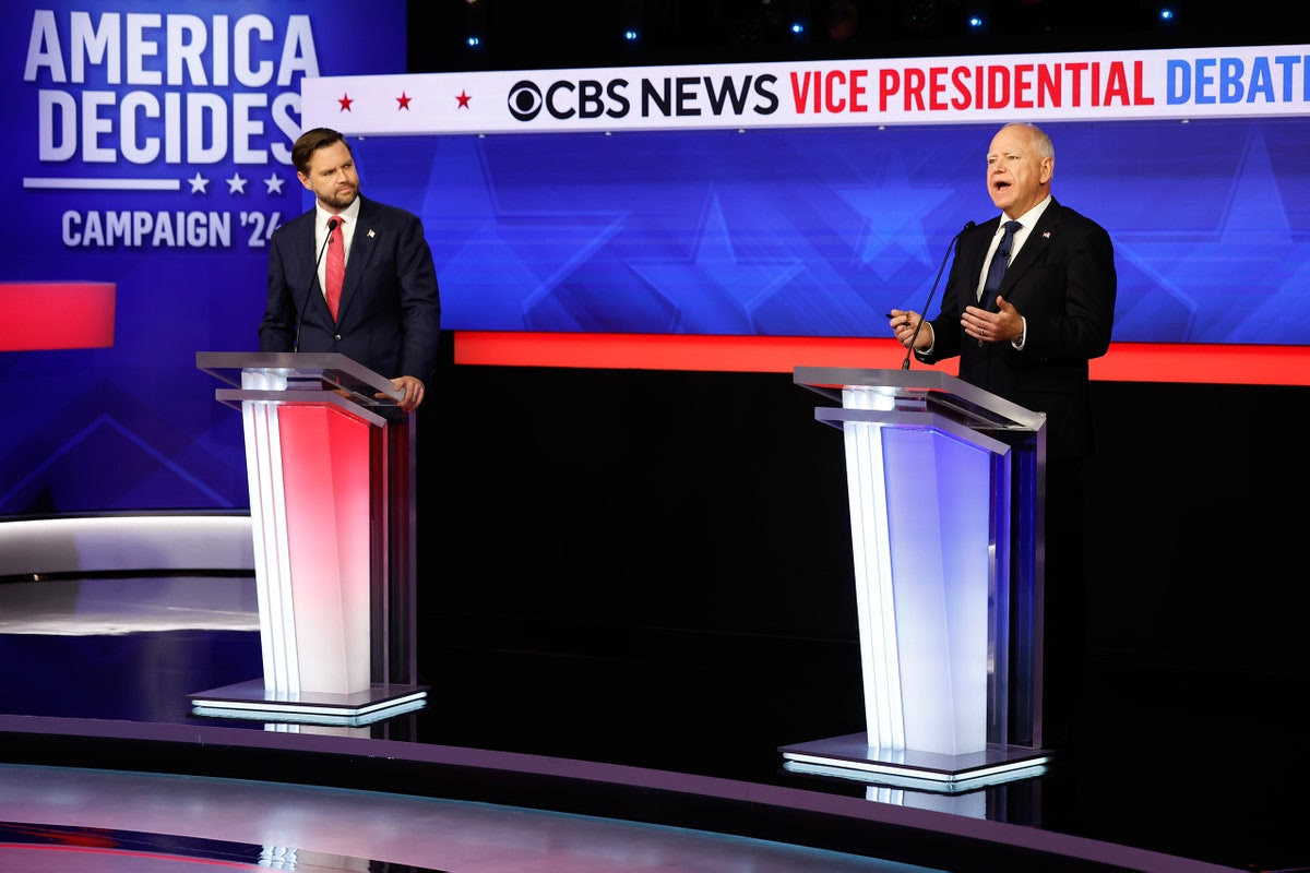 Republican vice presidential candidate, Sen. JD Vance (R-OH), and Democratic vice presidential candidate, Minnesota Gov. Tim Walz, participate in a debate at the CBS Broadcast Center on October 1, 2024