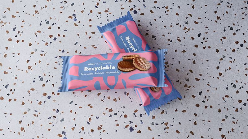 A pink and blue wrappers with a picture of cookies

Description automatically generated