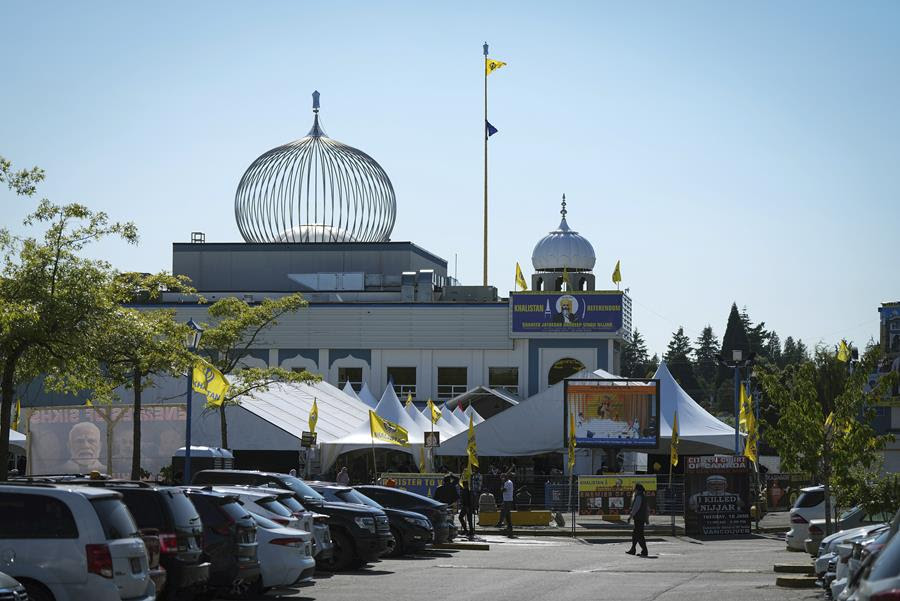 The parking lot outside of a temple.