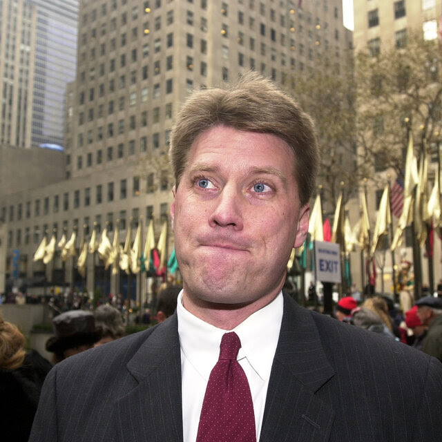 A photo of Fred C. Trump III, the nephew of former president Donald Trump, standing in front of Rockefeller Center.