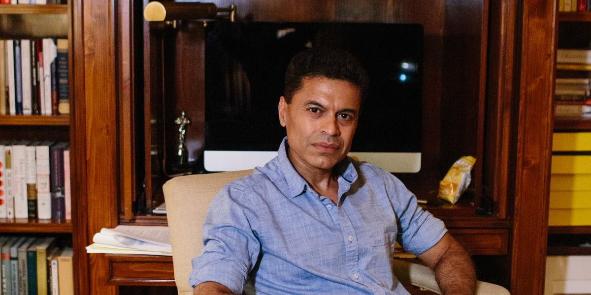 Fareed Zakaria, the CNN host and author, in the study of his brownstone townhouse in Manhattan, Jan. 13, 2019. Zakaria has lived here for 14 years and calls the English pine-paneled study the heart and soul of the home. (Gabriela Bhaskar/The New York Times)