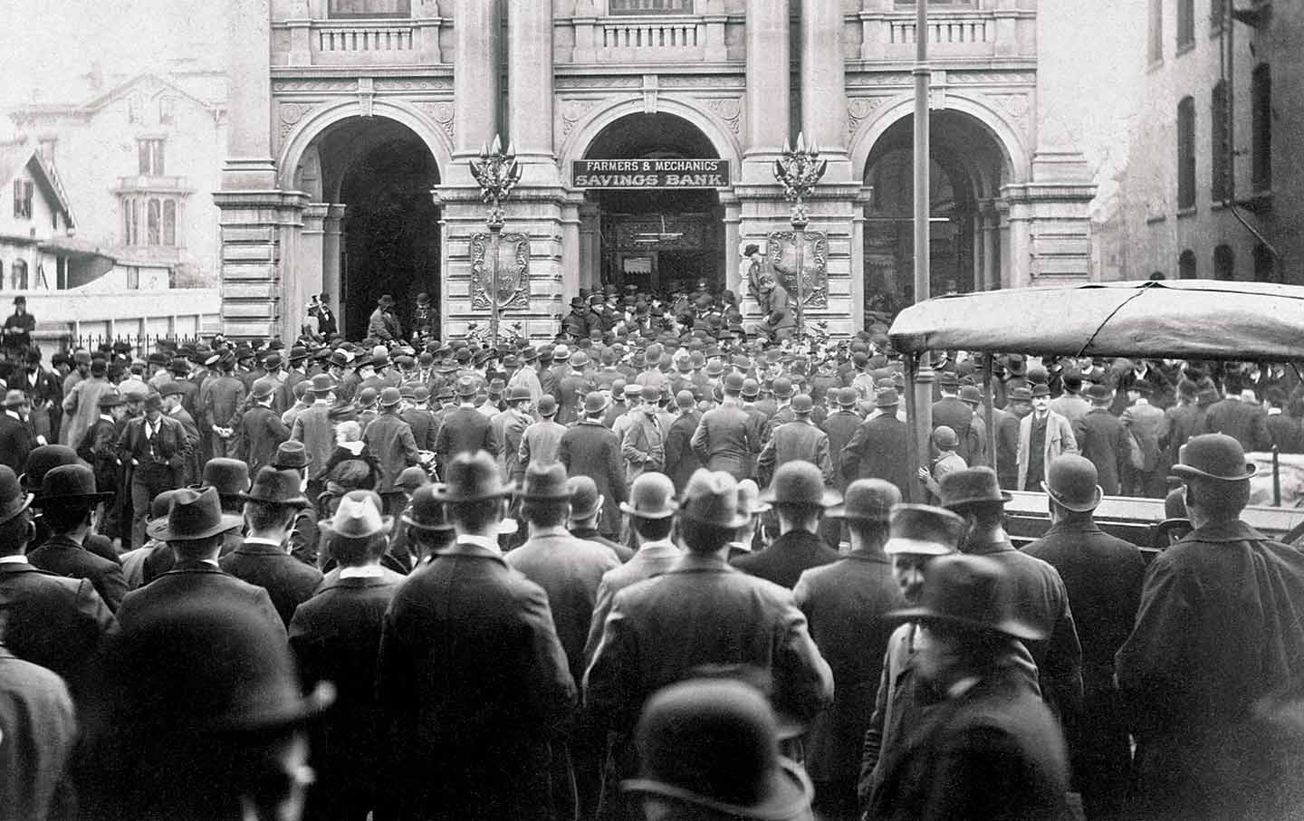 A crowd outside Minneapolis’s Farmers and Mechanics Savings Bank during an economic crisis in May 1893.