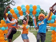 Participants at a Global 6K for Water site in Austin, Texas, jump for joy at the 2019 event. Leap into the new year with that kind of excitement, and this could be you.