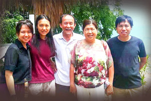 Raymond Koh is with his wife, two daughters, and a son.