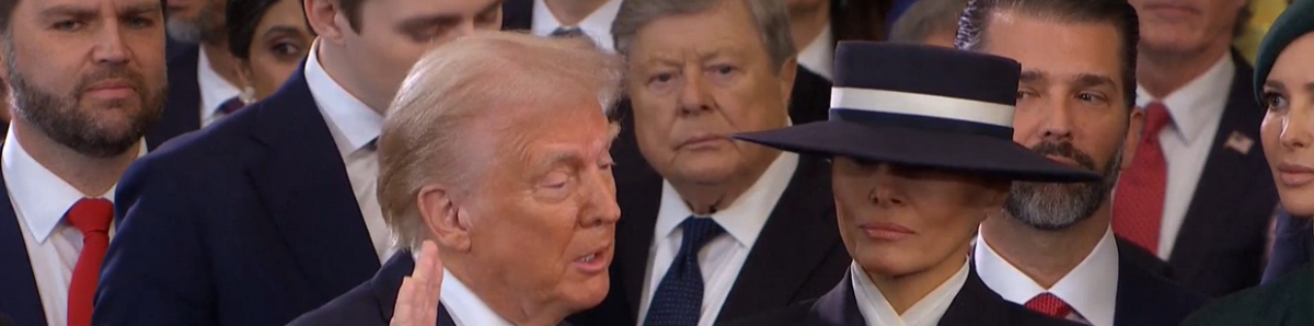 Banner showing Trump being sworn in as President.