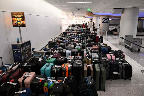 Last Friday's global IT outage caused a domino effect of flight cancellations and travel woes. AFP