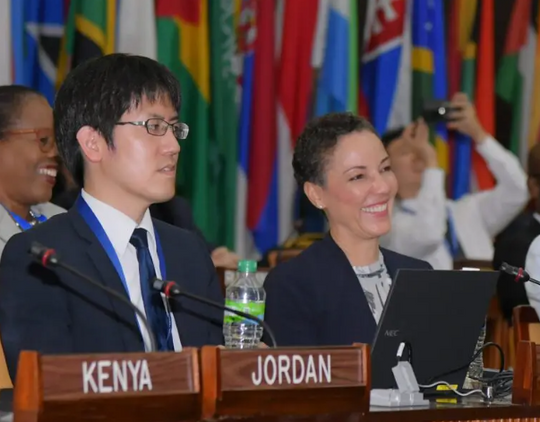 Minister of Foreign Affairs and Foreign Trade, Senator the Hon. Kamina Johnson Smith (right), reacts to a musical performance at a meeting of the 30th Session of the Assembly of the International Seabed Authority (ISA) at the agency’s headquarters in Kingston, on Wednesday (July 23). Seated beside her is Japan’s representative, Hiroaki Ishihara.