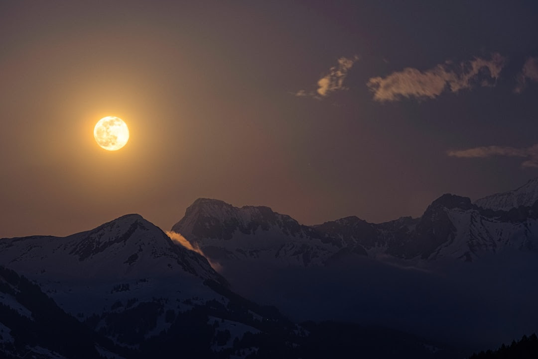 silhouette of mountains during sunset