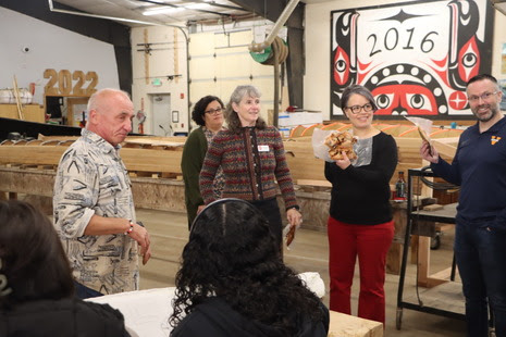 Members of the state board of education tour a woodshop at Neah Bay Schools. 