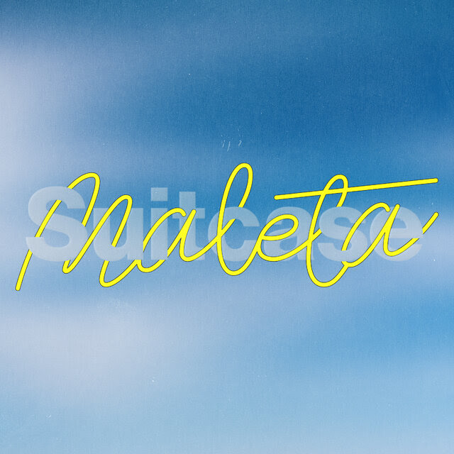 The Spanish word “maleta,” written in bright yellow script, looping in and out of the word “suitcase” in block print, against a sky blue background.