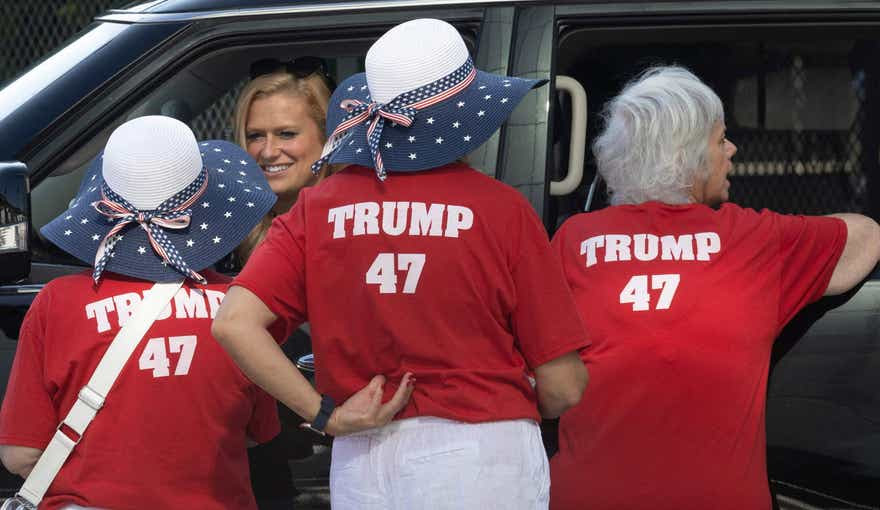 Volunteers help to direct vehicles in downtown Milwaukee in preparation for the Republican National Convention.