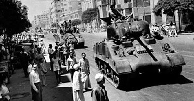 Egyptian army tanks move in on the roads of Cairo during the 1952 Free Officers’ coup.