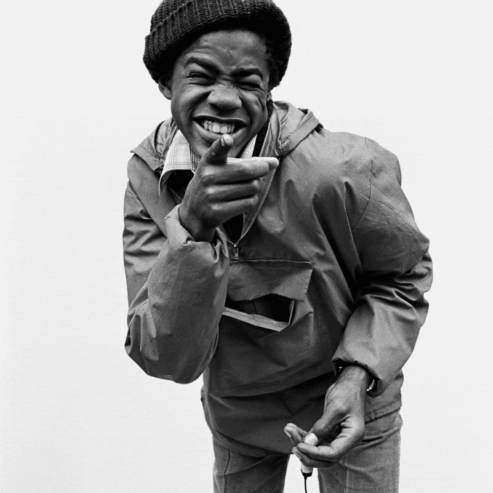 New exhibition coming to Tate Britain! 2 Rotating images of a boy pointing at the camera, a protest march and a group of people standing above the crowd