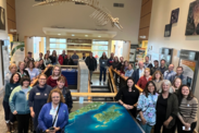 MAFAC members and NMFS staff pose for a group photo at the Alaska Fisheries Science Center Kodiak Lab