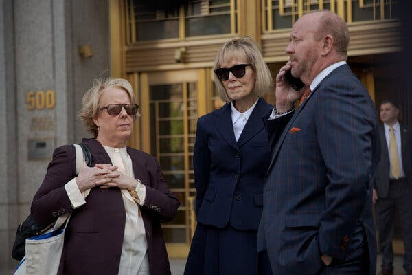 Roberta Kaplan and E. Jean Carroll stand outside a courthouse.