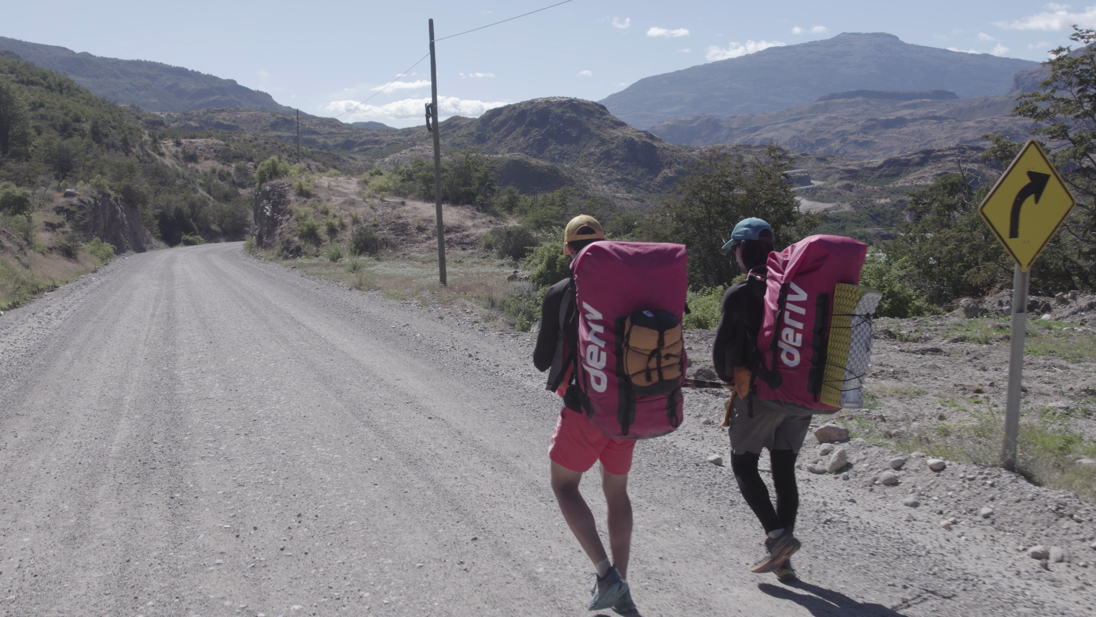 Hikers with their Deriv-branded backpacks