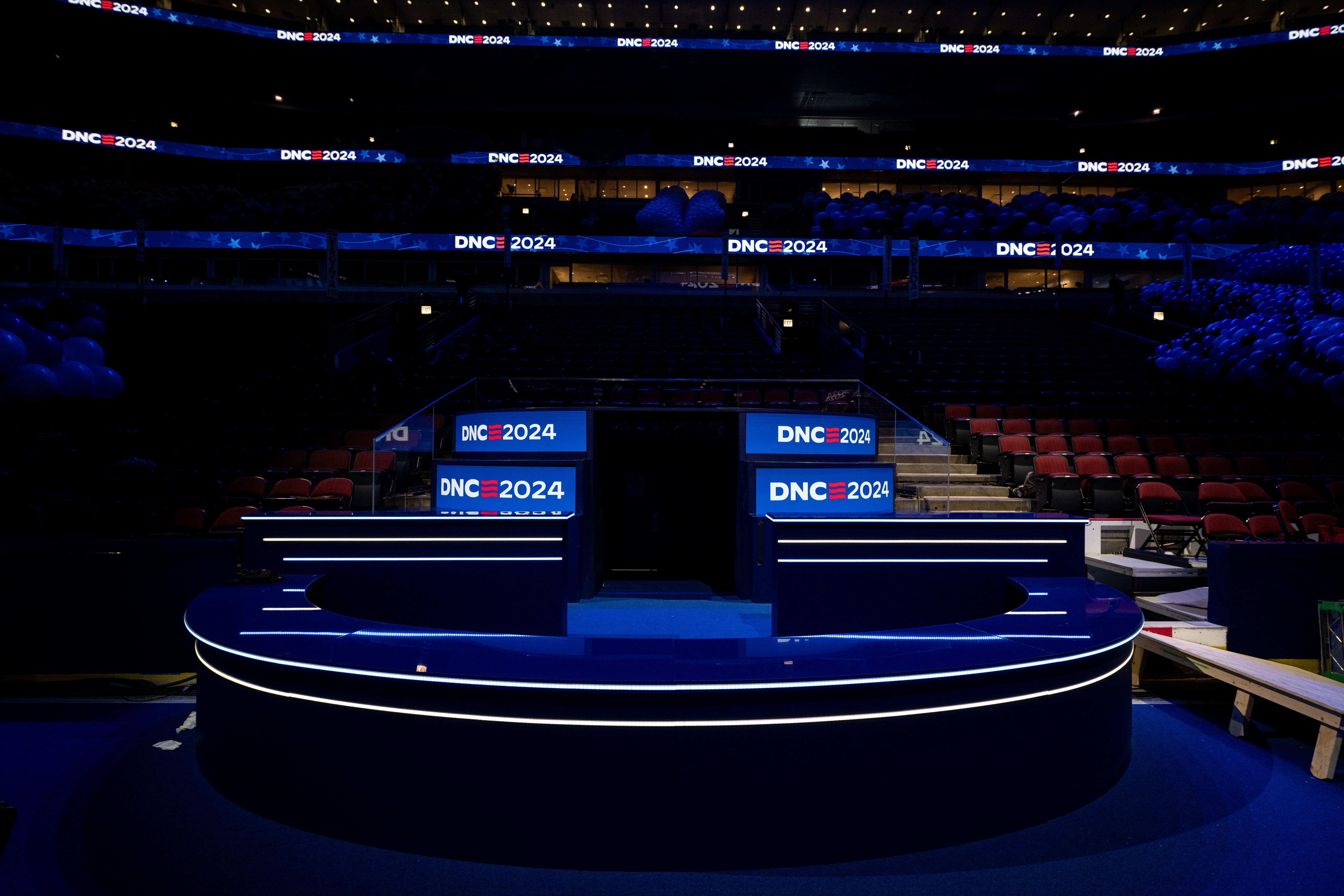 photo of creator platform with lights and DNC 2024 logo