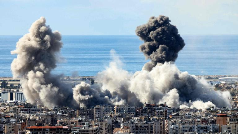 TOPSHOT - Smoke rises from the site of an Israeli airstrike that targeted Beirut’s southern suburbs on November 26, 2024, amid the ongoing war between Israel and Hezbollah. Israel's security cabinet was due to meet on November 26 to vote on a proposed ceasefire in its war with Hezbollah in Lebanon, an official said, while the White House voiced optimism that a deal was close. (Photo by IBRAHIM AMRO / AFP)