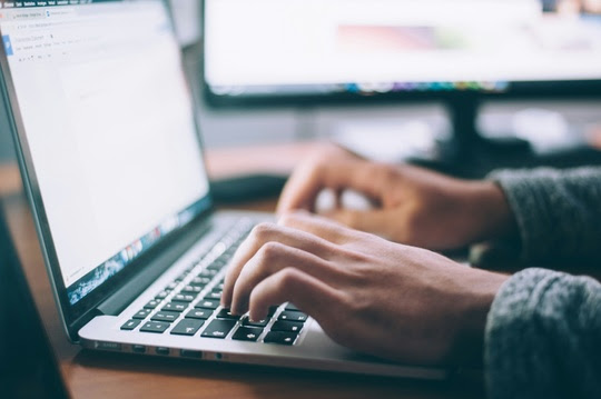 man at keyboard - Unsplash.com