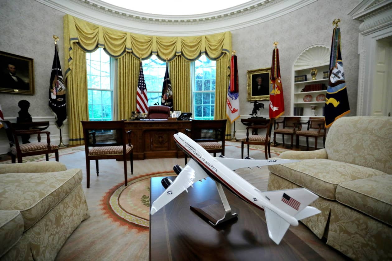 A model of the next version of Air Force One is seen in the Oval Office in 2020.