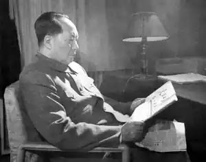 1961 mao zedong reading
peoples daily in hangzhou 1.jpg