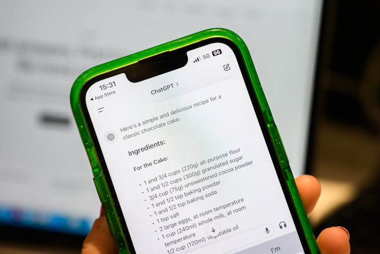 Photo of a phone screen showing ChatGPT providing a cake recipe.