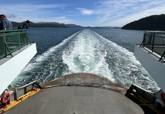 Wake on the water behind a ferry