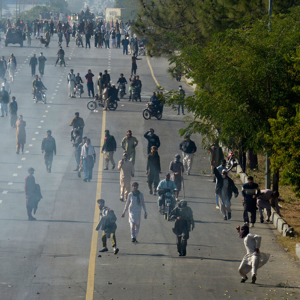 Protesters on a road. 