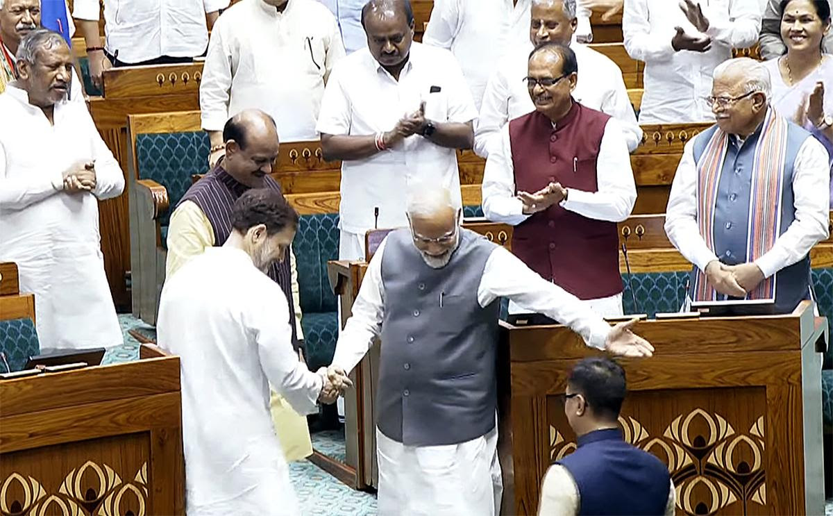 Prime Minister Narendra Modi and Leader of Opposition Rahul Gandhi shake hands at Parliament House in New Delhi on June 26, 2024.