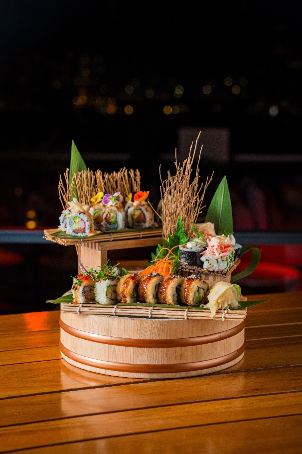A sushi on a wooden standAI-generated content may be incorrect. A sushi on a wooden standAI-generated content may be incorrect.