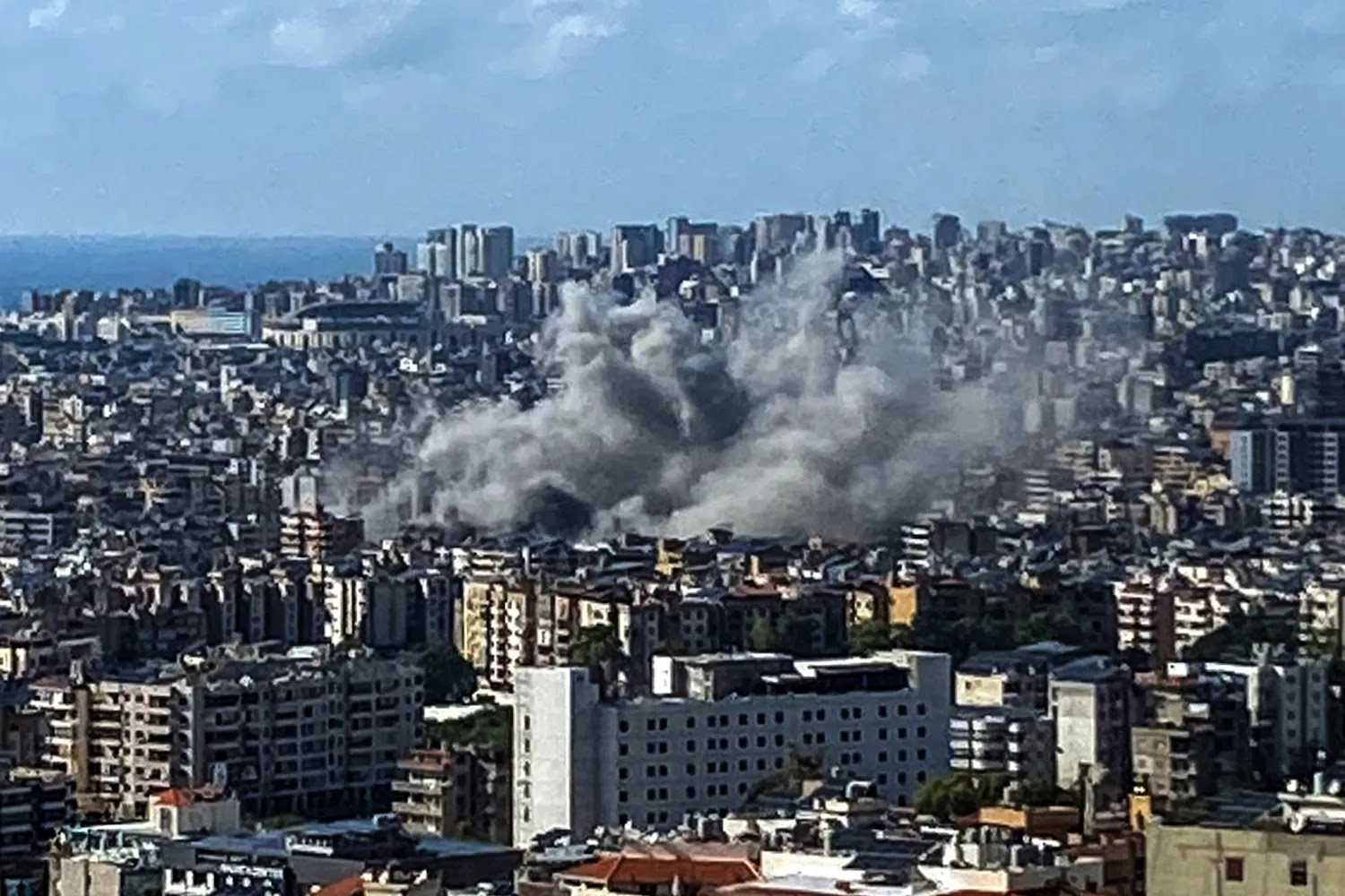 Thick smoke rises above the southern suburbs of Beirut after an Israel strike.