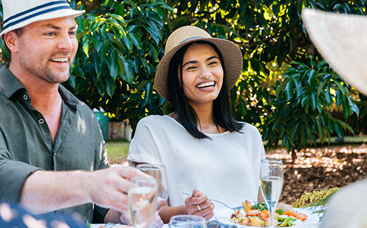 Couple enjoying some food and wine