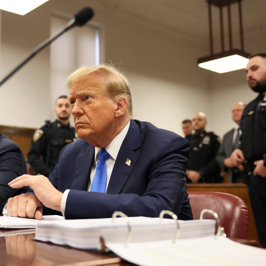Former President Donald J. Trump in a courtroom.