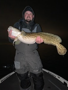 Phillip Duracz, a past State Record Fish burbot tile holder, with his 11.4-pound burbot.