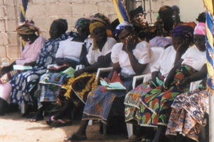 Church members are sitting outside.