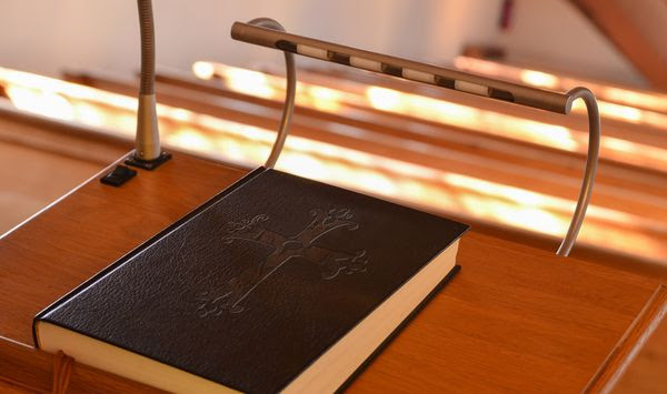 Bible on a pulpit. Photo credit: Wolkenengel565 via Shutterstock. FILE