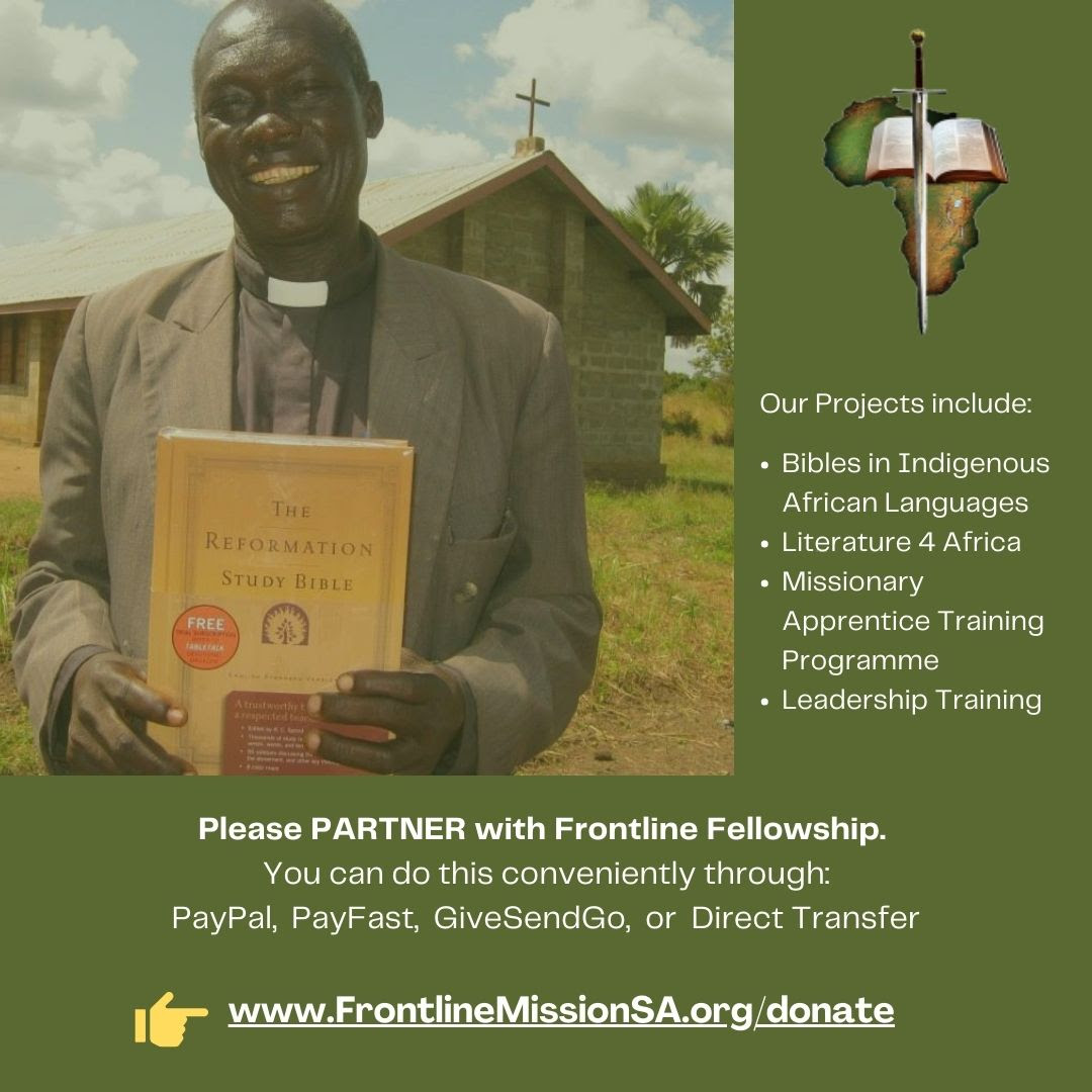 Pic of a African Pastor holding a Bible donated by Frontline Fellowship.