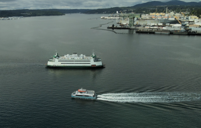 An aerial view of Sinclair Inlet near Bremerton with a Washington State Ferry and Kitsap Transit Fast Ferry in the water