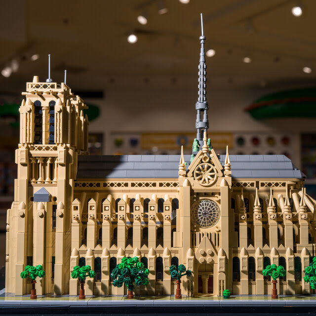 A new Lego model of the Cathedral of Notre-Dame features spires and plastic trees.