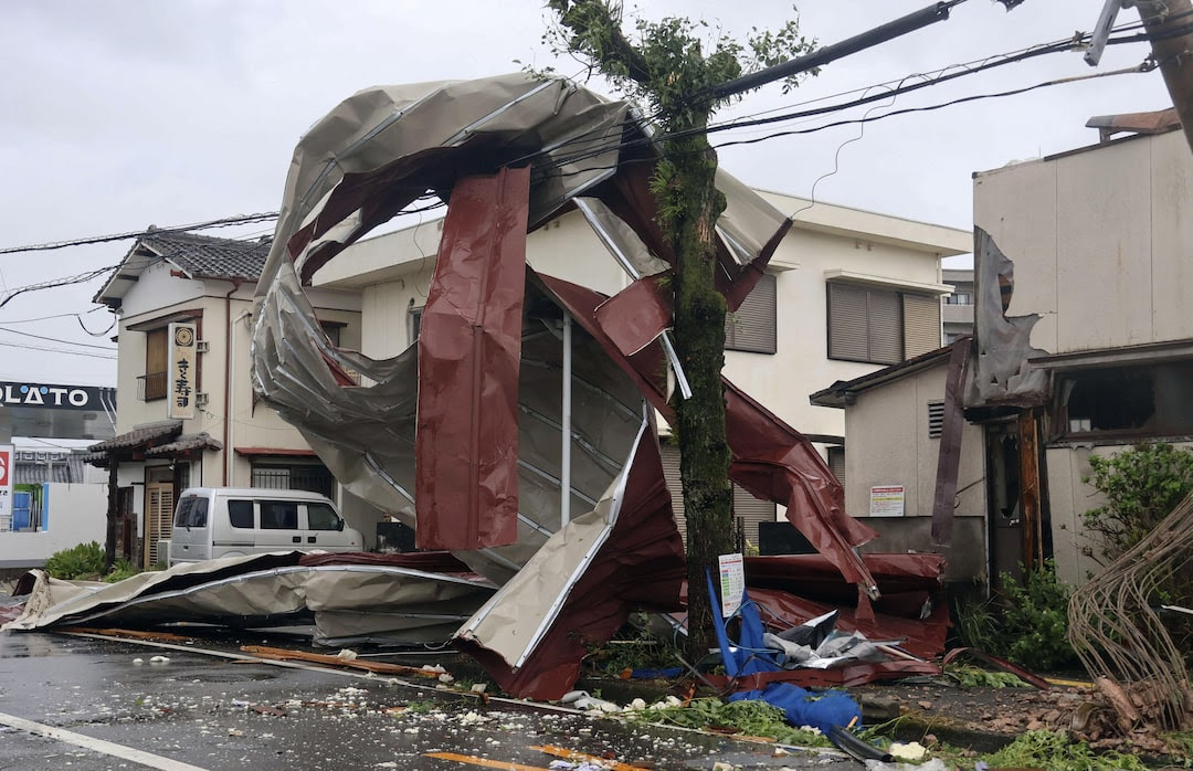 An object blown by strong winds caused by Typhoon Shanshan is stranded on a power line in Miyazaki, southwestern Japan, August 29, 2024, in this photo taken by Kyodo.