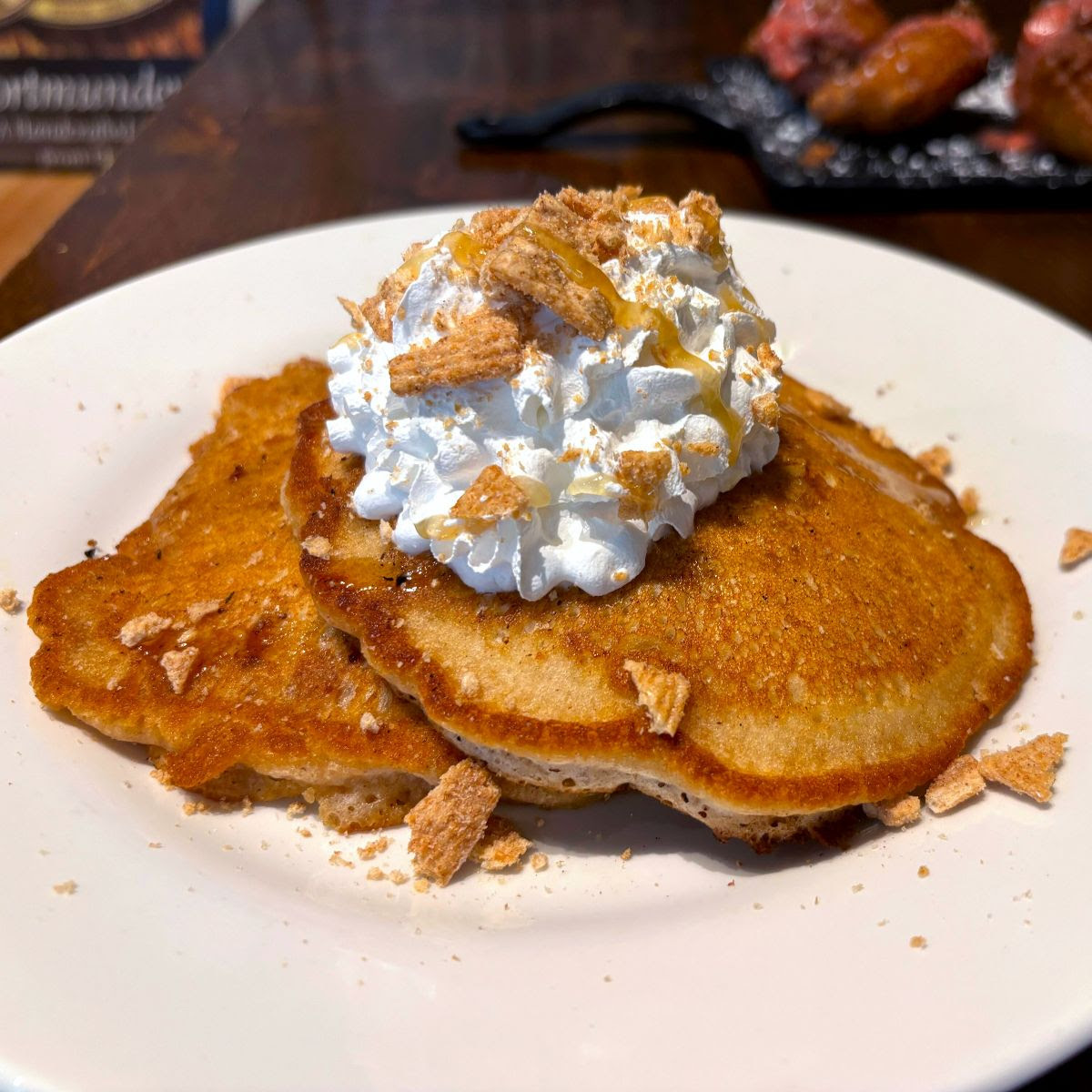 Close up shot of cinnamon toast crunch pancakes from the GLBC brewpub brunch menu.