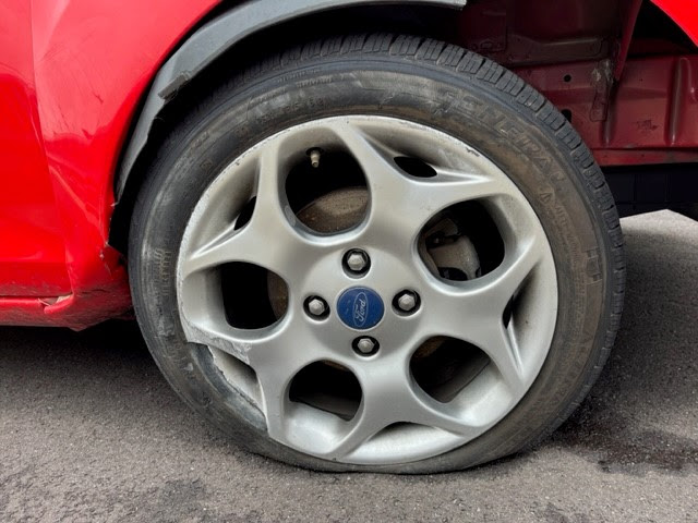 Flat tire - Pothole Damage.jpg