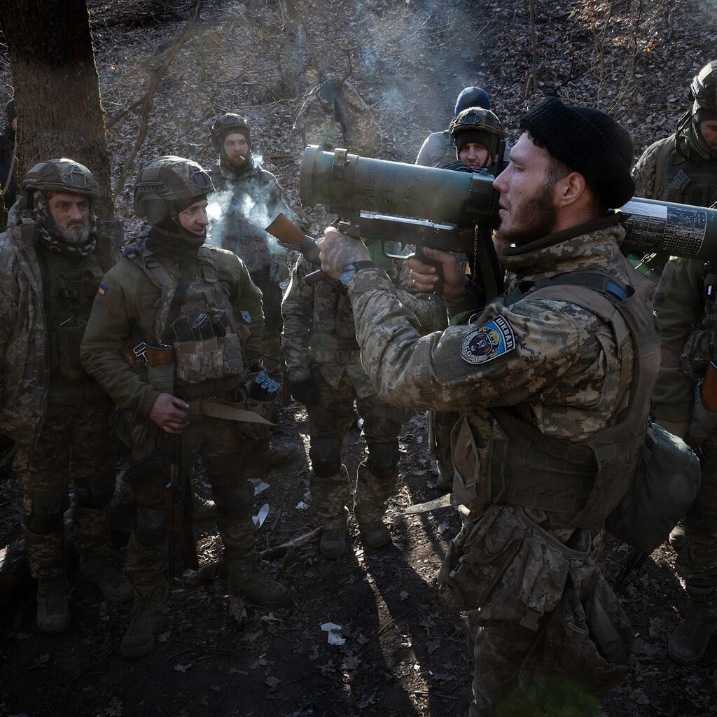 A group of soldiers engaged in a training exercise.