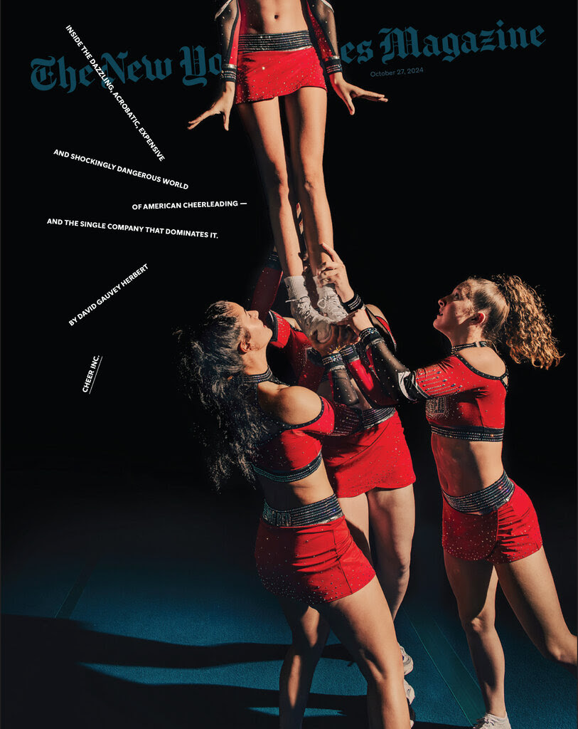 The cover of The New York Times Magazine, showing three cheerleaders holding another cheerleader high up in the air. 