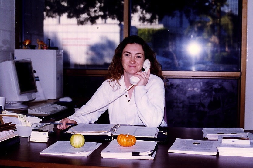 Annette Hébert sits at her desk in El Monte, year unknown.