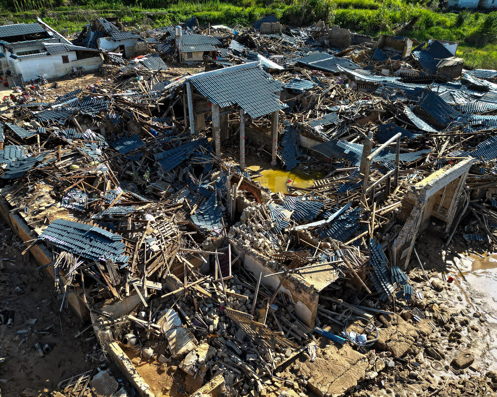 An aerial view of collapsed buildings.