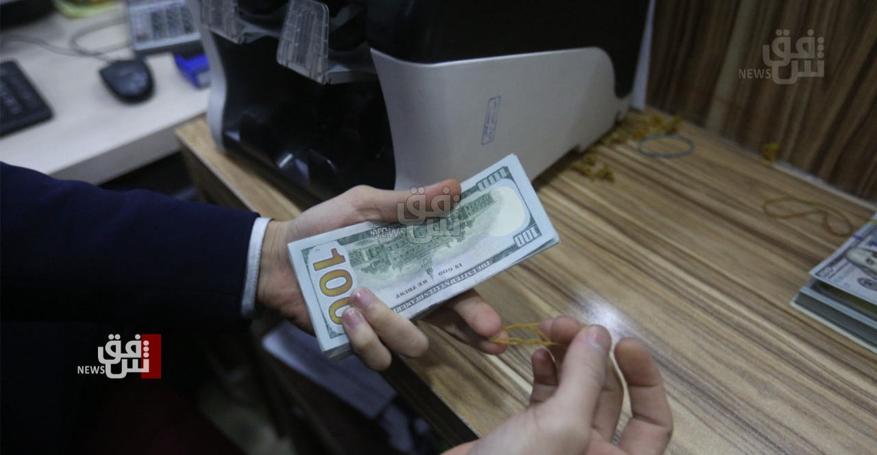 Iraq cracks down on dollar market disparity