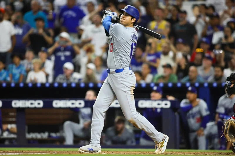 Dodgers designated hitter Shohei Ohtani hits a two-run home run against the Miami Marlins